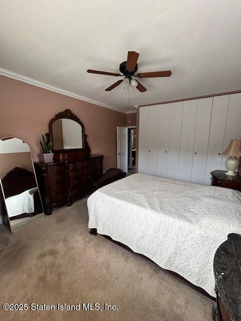1000 Clove Road, Unit LO Staten Island, NY 10301 - Photo 10 of 13 a spacious bedroom with a bed a dresser and mirror
