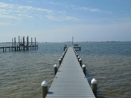 a view of a balcony with chairs