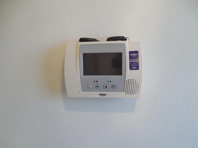 a view of empty room with a fireplace