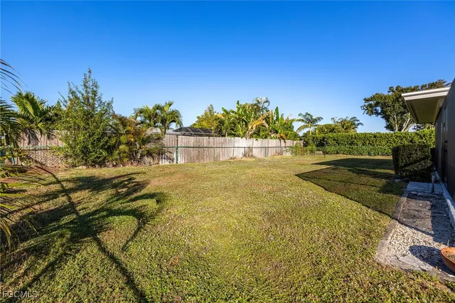 a view of a yard with an outdoor space