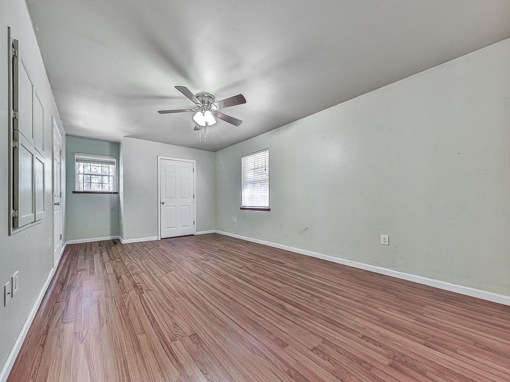 424 Shamrock Drive Dalton, GA 30721 - Photo 20 of 38 an empty room with wooden floor and windows