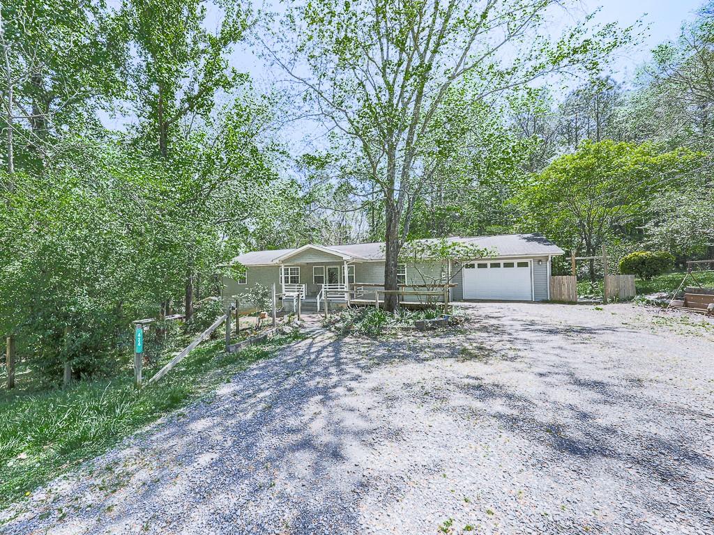 424 Shamrock Drive Dalton, GA 30721 - Photo 26 of 38 a view of a house with a yard and large trees