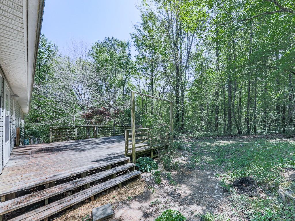 424 Shamrock Drive Dalton, GA 30721 - Photo 29 of 38 a view of a yard with large trees