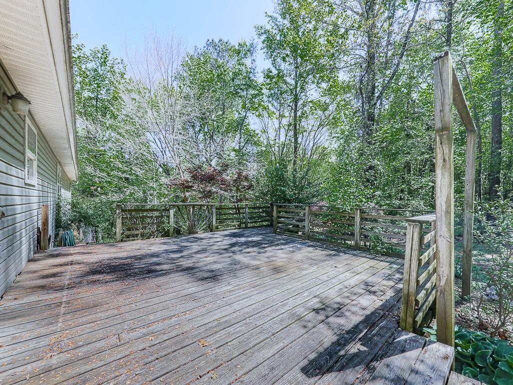 424 Shamrock Drive Dalton, GA 30721 - Photo 30 of 38 a view of a backyard with trees