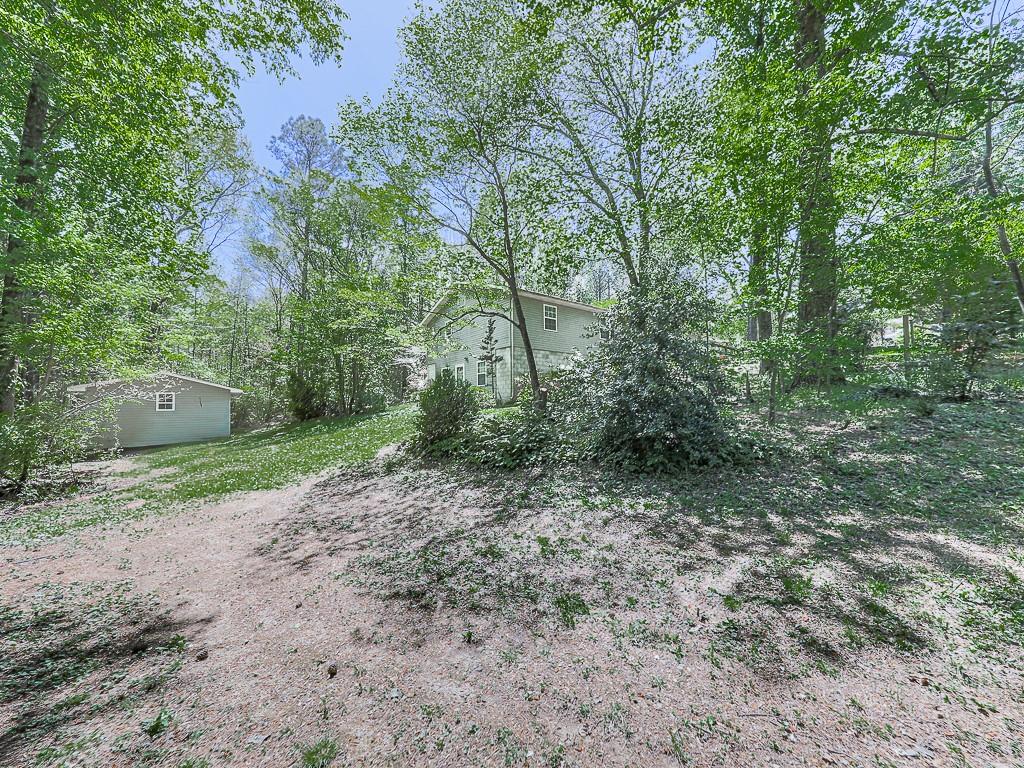 424 Shamrock Drive Dalton, GA 30721 - Photo 37 of 38 a big yard with lots of green space and house view