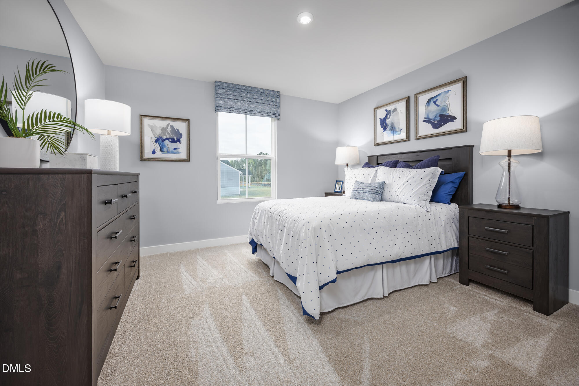 239 Country Side Way Fuquay-Varina, NC 27526 - Photo 10 of 15 a bedroom with a bed and a lamp on dresser