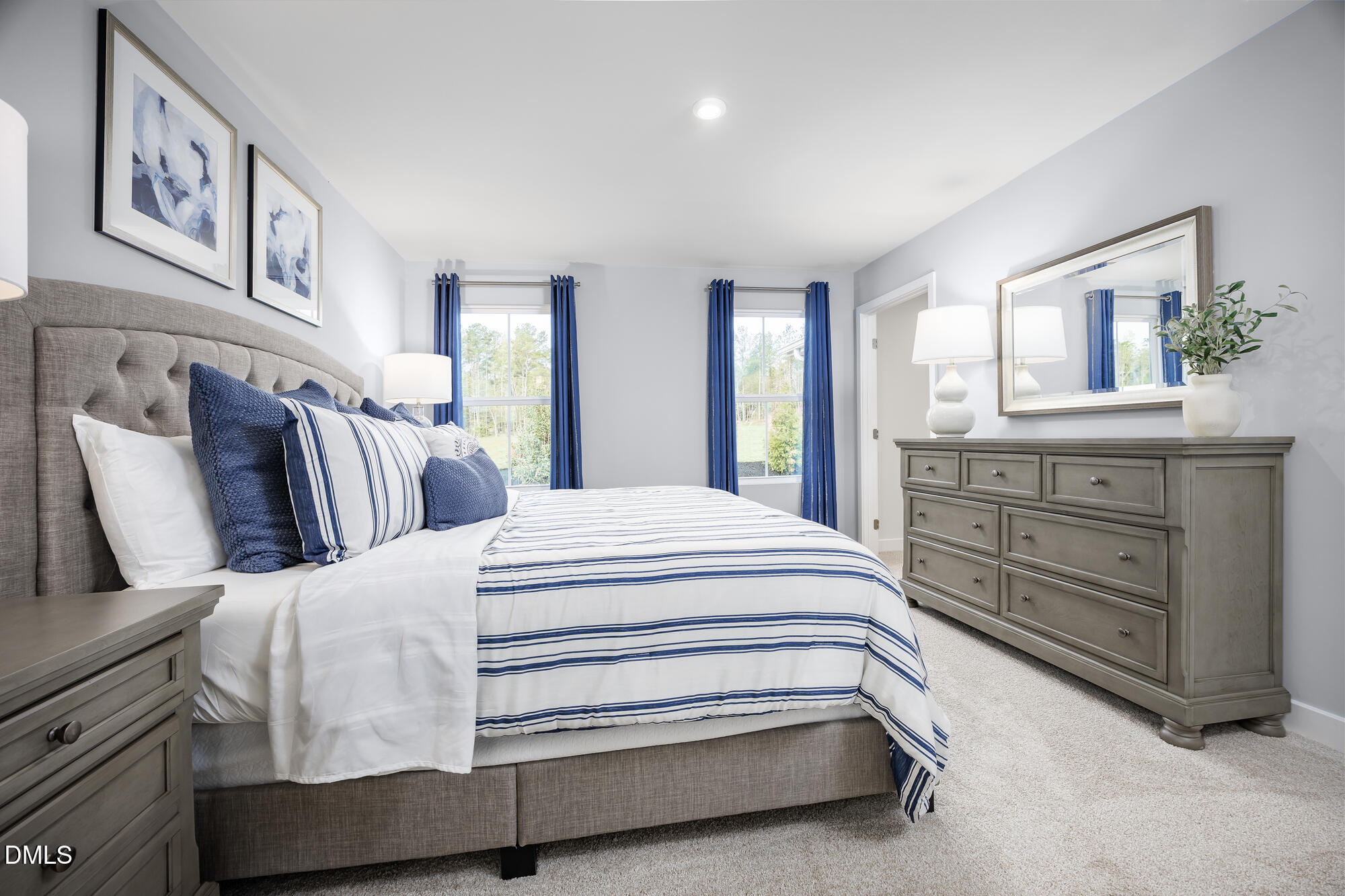 239 Country Side Way Fuquay-Varina, NC 27526 - Photo 8 of 15 a bedroom with a bed and lamp