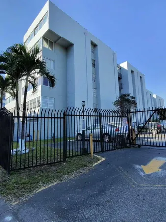 a view of a porch with a small yard