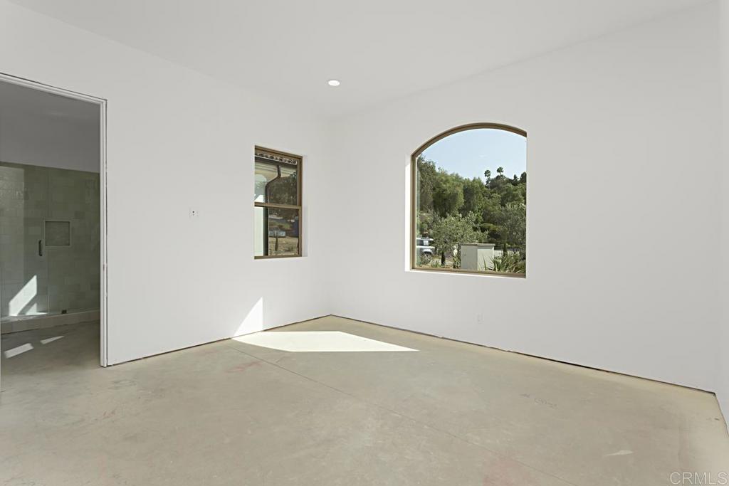 5808 Lake Vista Drive Bonsall, CA 92003 - Photo 25 of 40 an empty room with windows