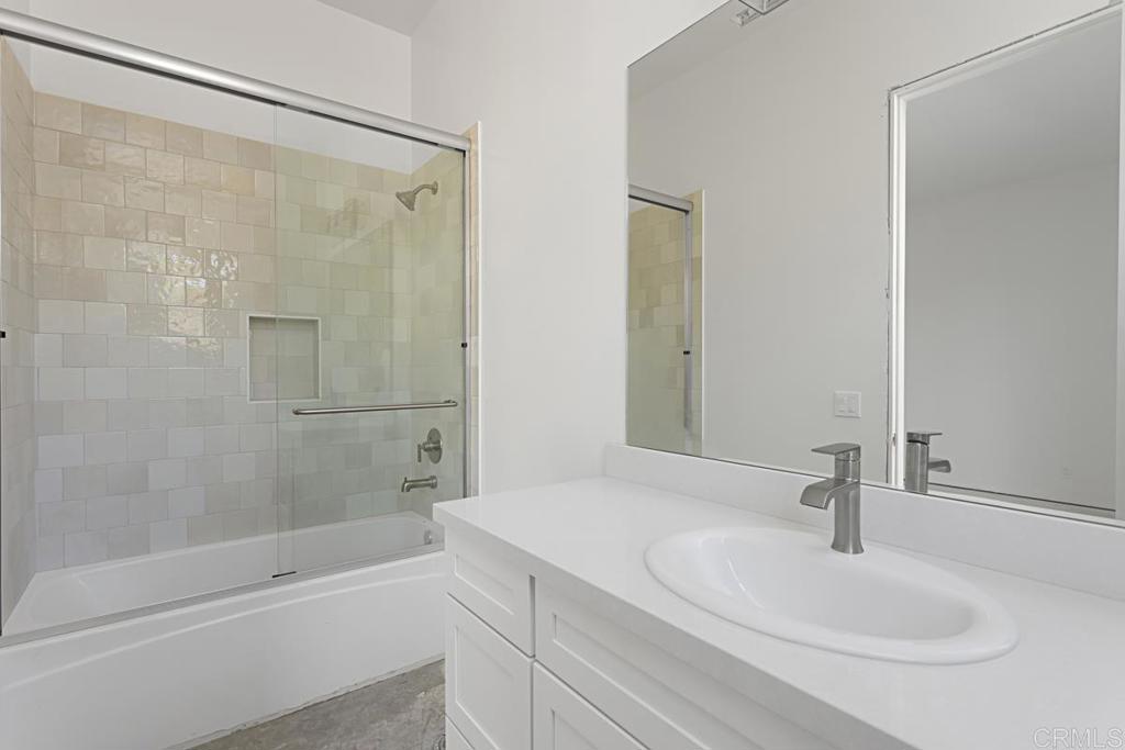 5808 Lake Vista Drive Bonsall, CA 92003 - Photo 28 of 40 a bathroom with a bathtub and a sink