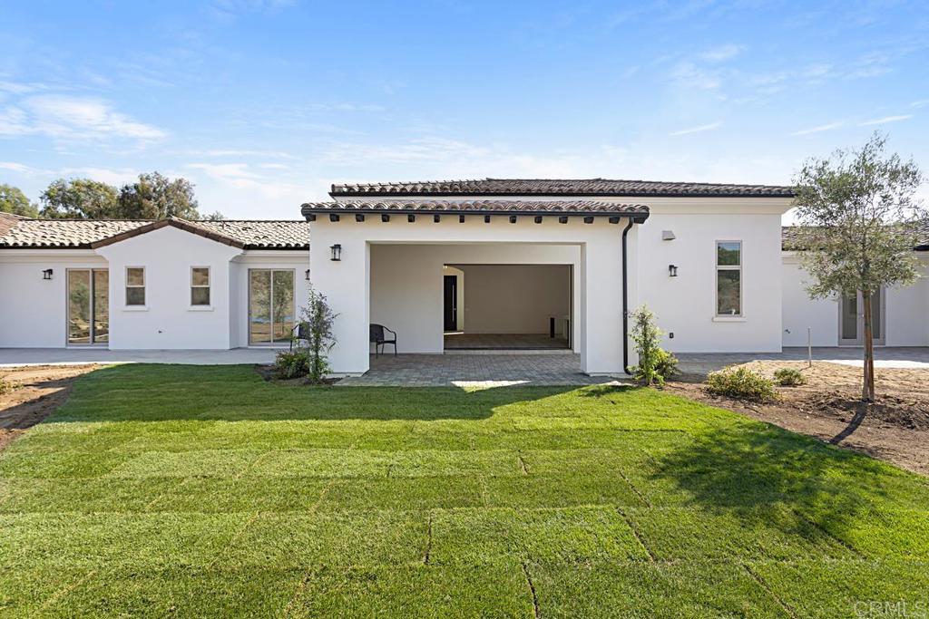 5808 Lake Vista Drive Bonsall, CA 92003 - Photo 31 of 40 a view of a house with a patio