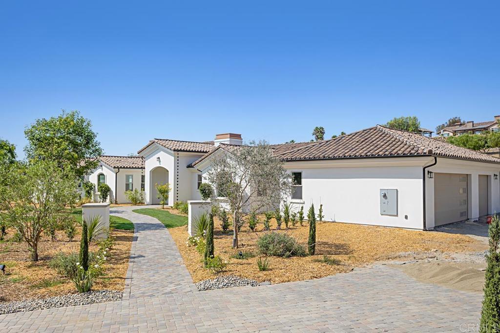 5808 Lake Vista Drive Bonsall, CA 92003 - Photo 39 of 40 a front view of a house with a yard
