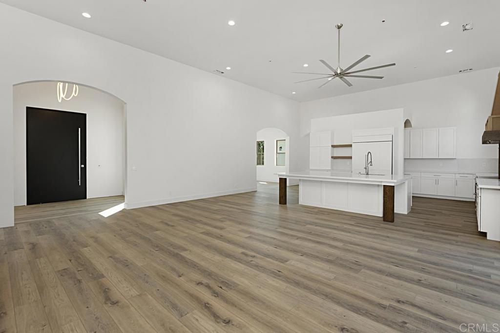 5808 Lake Vista Drive Bonsall, CA 92003 - Photo 6 of 40 a view of empty room with wooden floor