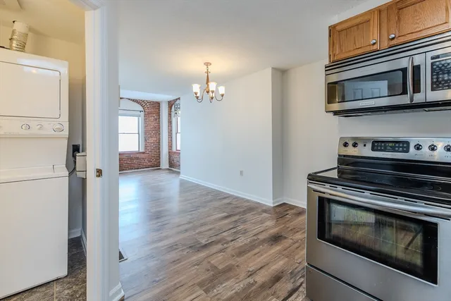 a kitchen with a stove and a microwave