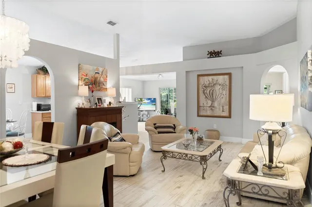 a living room with furniture and a table