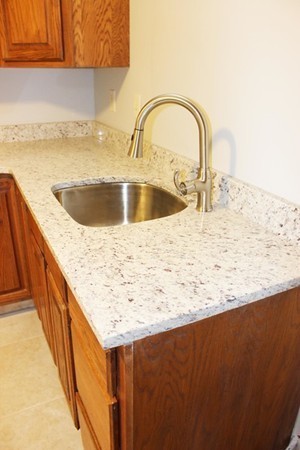 24 Sycamore Drive Rutland, MA 01543 - Photo 18 of 30 a close view of sink and tap