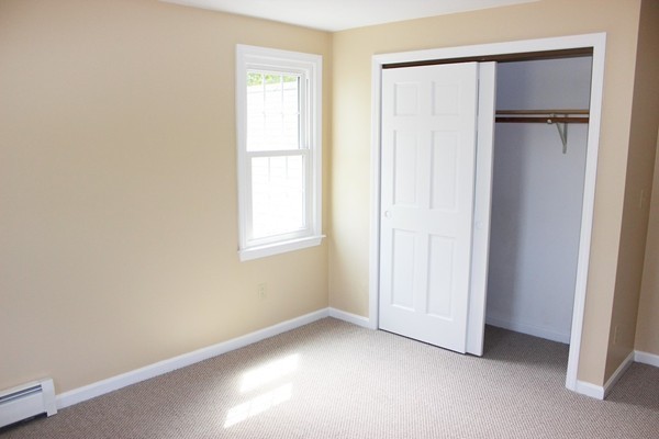 24 Sycamore Drive Rutland, MA 01543 - Photo 21 of 30 an empty room with windows and closet