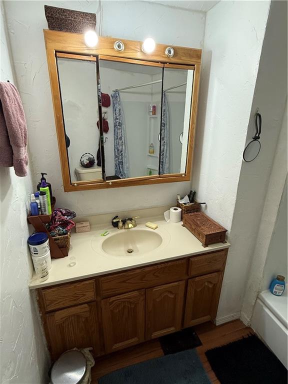 802 8th Street Mather, PA 15346 - Photo 12 of 27 a bathroom with a sink and a mirror