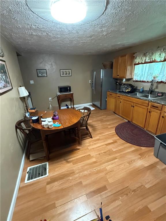 802 8th Street Mather, PA 15346 - Photo 13 of 27 a kitchen with a sink and cabinets