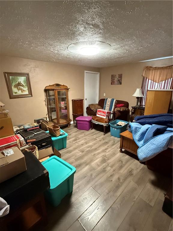 802 8th Street Mather, PA 15346 - Photo 15 of 27 a living room with furniture a air conditioner vent and a window