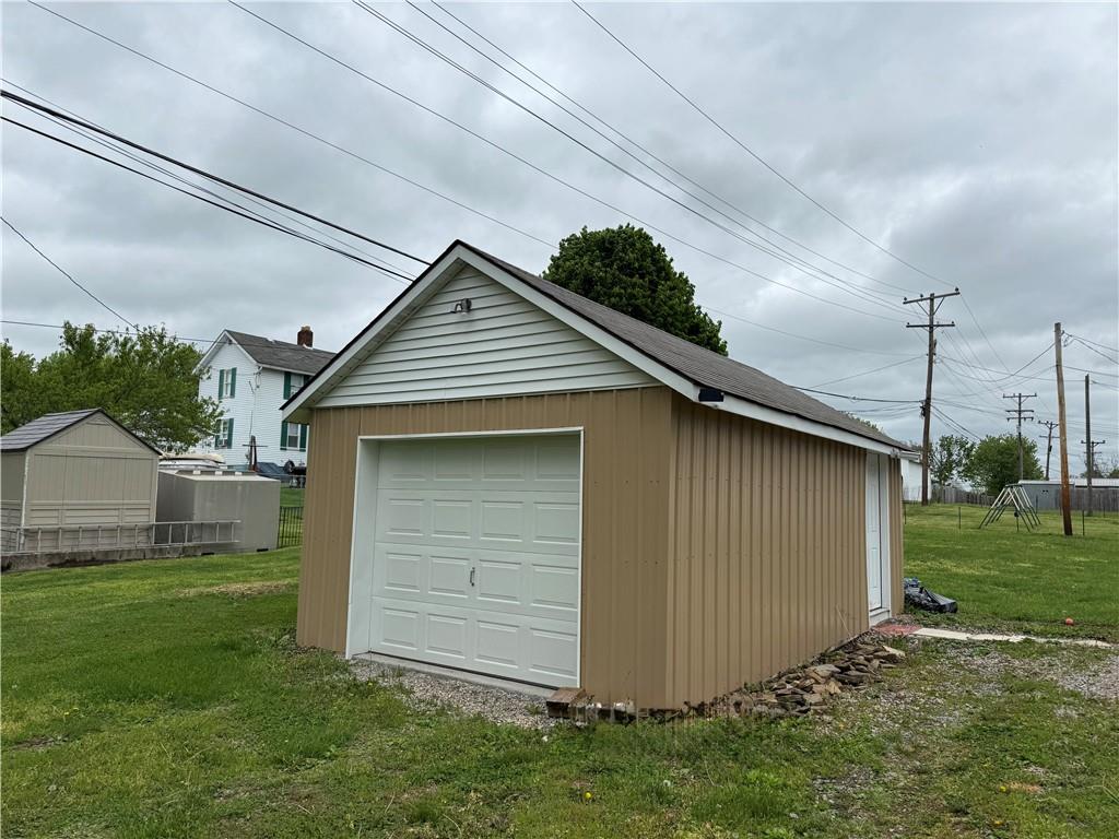 802 8th Street Mather, PA 15346 - Photo 4 of 27 a front view of house with a garden