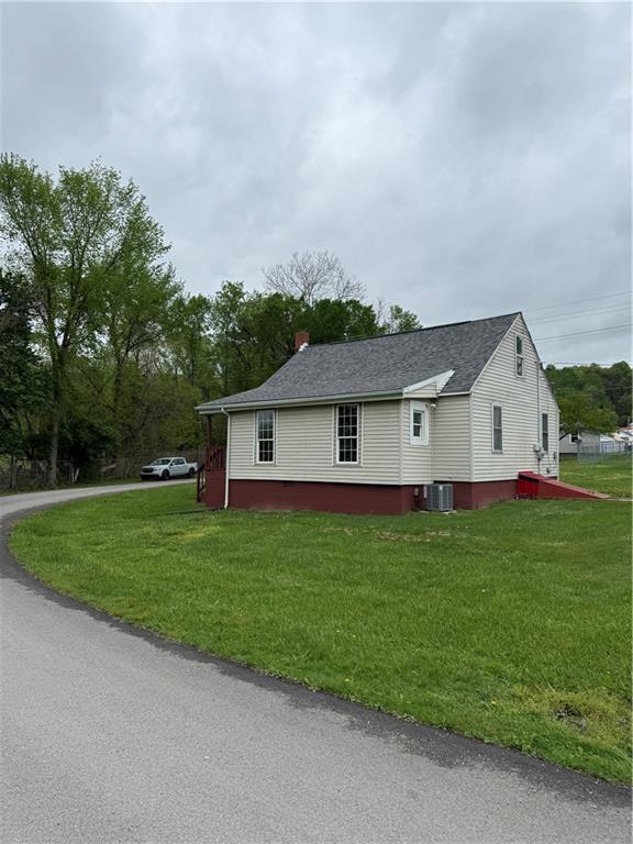 802 8th Street Mather, PA 15346 - Photo 8 of 27 a front view of house with yard and green space