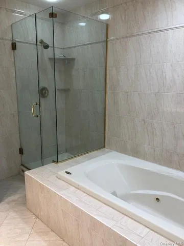 a view of a small space with wooden floor