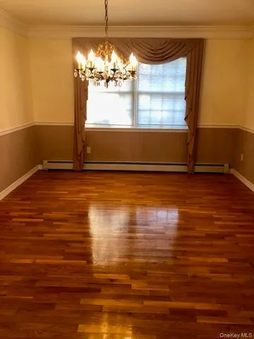a bathroom with a sink toilet and mirror