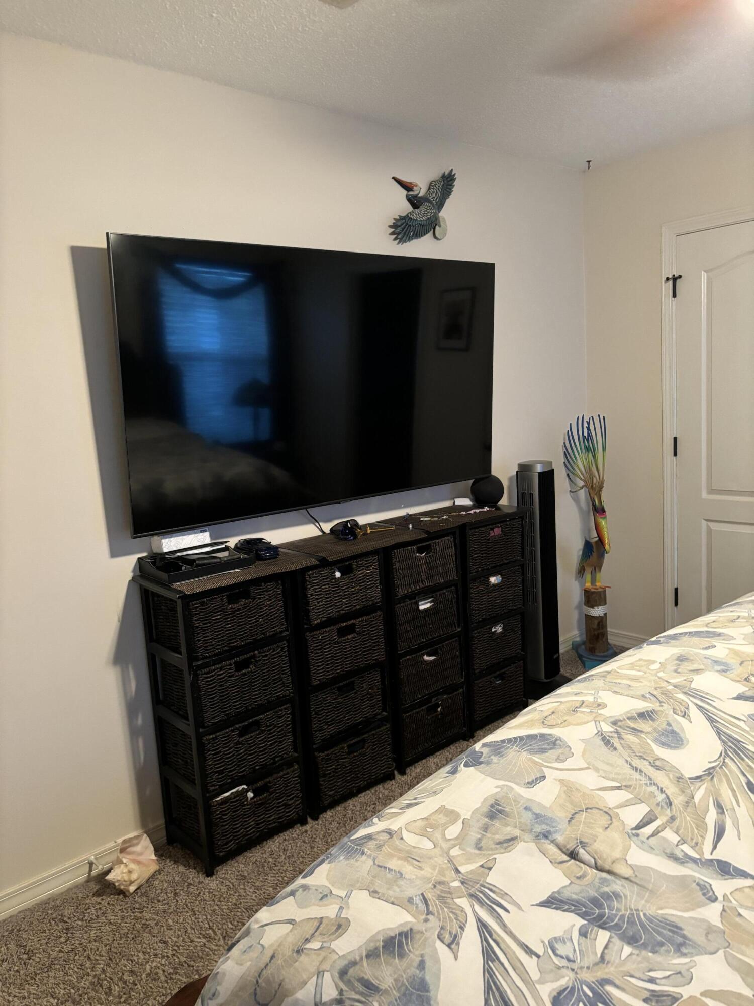 160 South Harborview Road Santa Rosa Beach, FL 32459 - Photo 8 of 20 a living room with furniture and flat screen tv