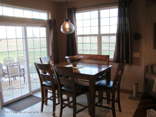 136 Native Springs Drive Rifle, CO 81650 - Photo 30 of 42 a dining room with furniture and window