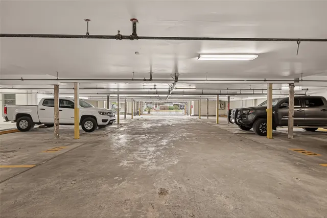 a view of a balcony with wooden fence