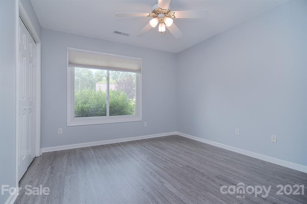 4306 Atkinson Way Monroe, NC 28110 - Photo 15 of 31 a view of wooden floor and windows in a room