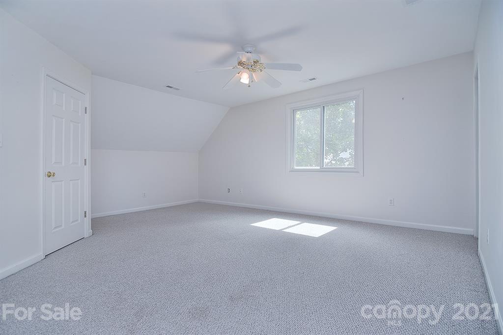 4306 Atkinson Way Monroe, NC 28110 - Photo 20 of 31 a view of an empty room with a window