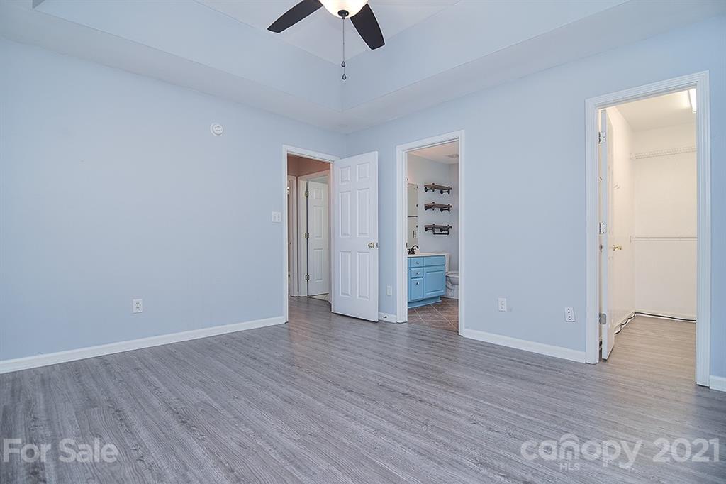 4306 Atkinson Way Monroe, NC 28110 - Photo 23 of 31 wooden floor in an empty room