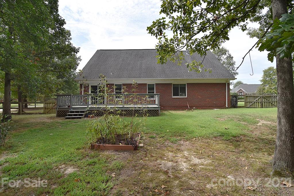4306 Atkinson Way Monroe, NC 28110 - Photo 29 of 31 a front view of a house with garden