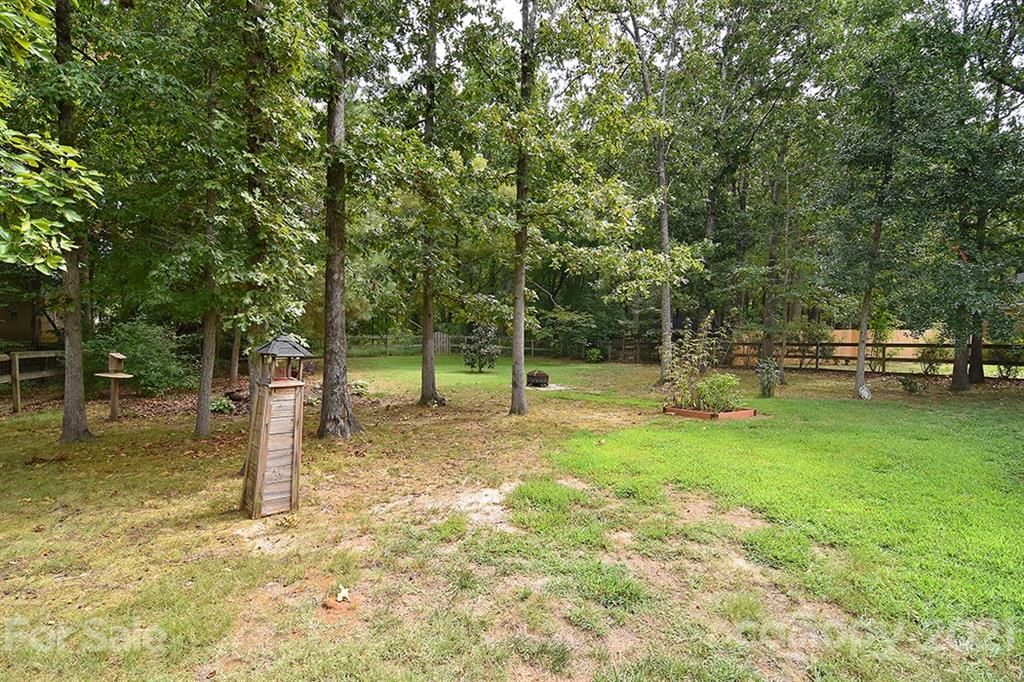 4306 Atkinson Way Monroe, NC 28110 - Photo 31 of 31 a view of a park with swings