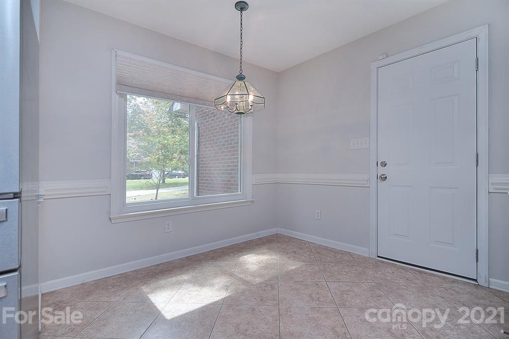 4306 Atkinson Way Monroe, NC 28110 - Photo 8 of 31 a view of a windows and chandelier in a room