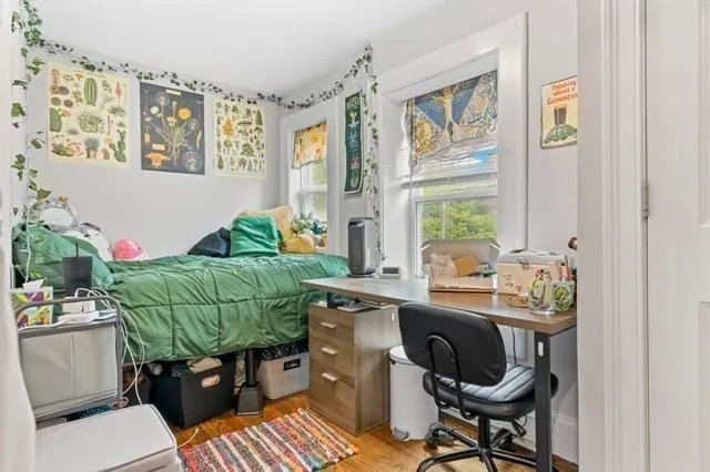 a kitchen with a sink and a refrigerator