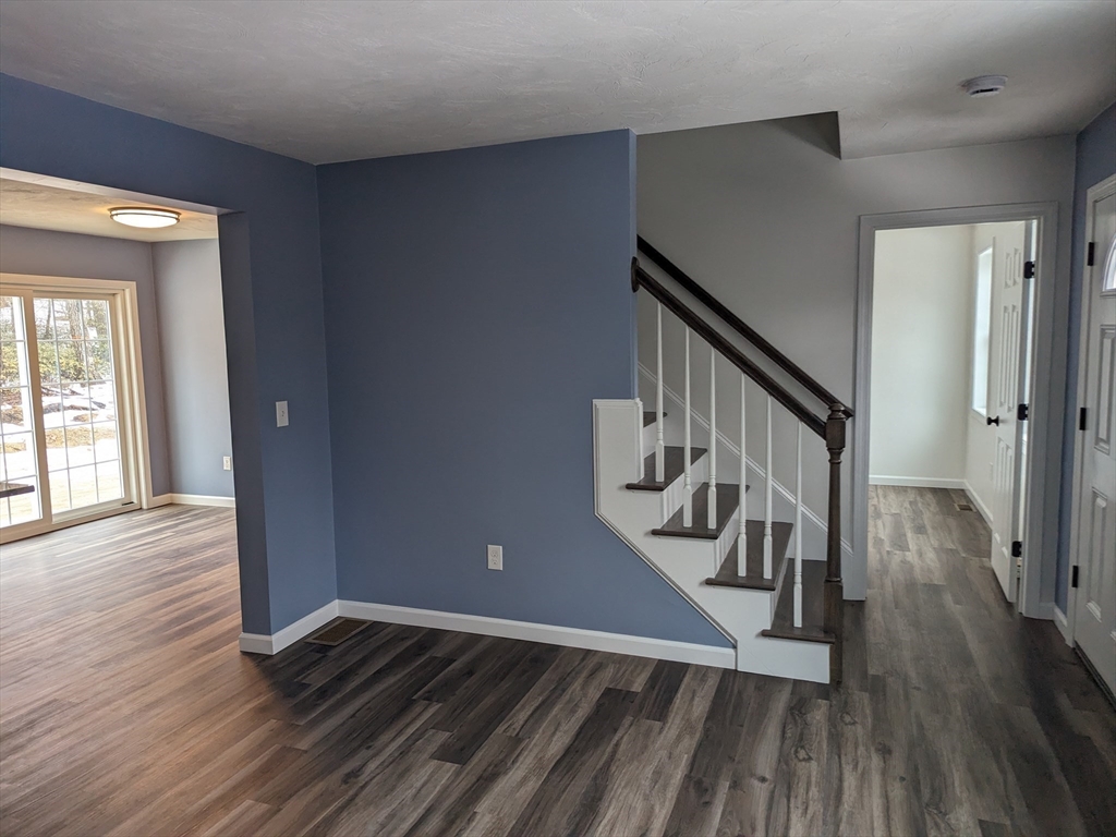 514 Old County Road Holland, MA 01521 - Photo 15 of 40 a view of an entryway with wooden floor