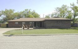 4802 Carole Lane Amarillo, TX 79110 - Photo 1 of 1 a front view of a house with a yard and porch