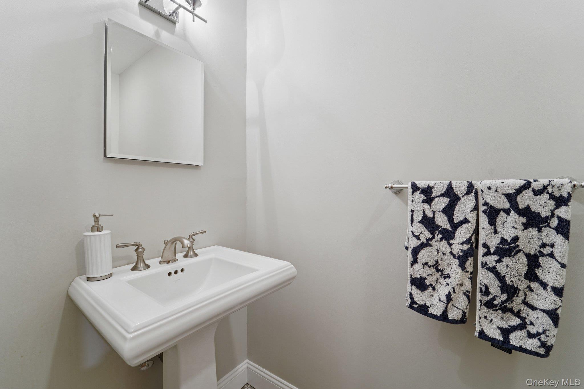 84 Townline Road Nanuet, NY 10954 - Photo 13 of 44 Bathroom featuring baseboards and a sink