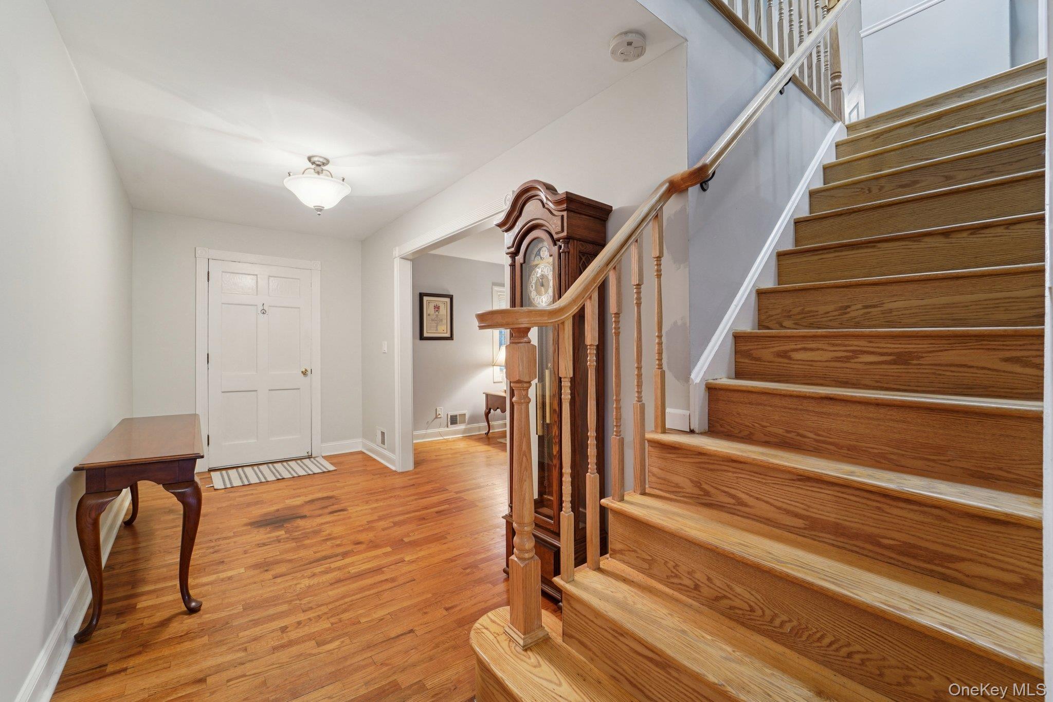84 Townline Road Nanuet, NY 10954 - Photo 14 of 44 Foyer entrance with stairs and light wood-style floors