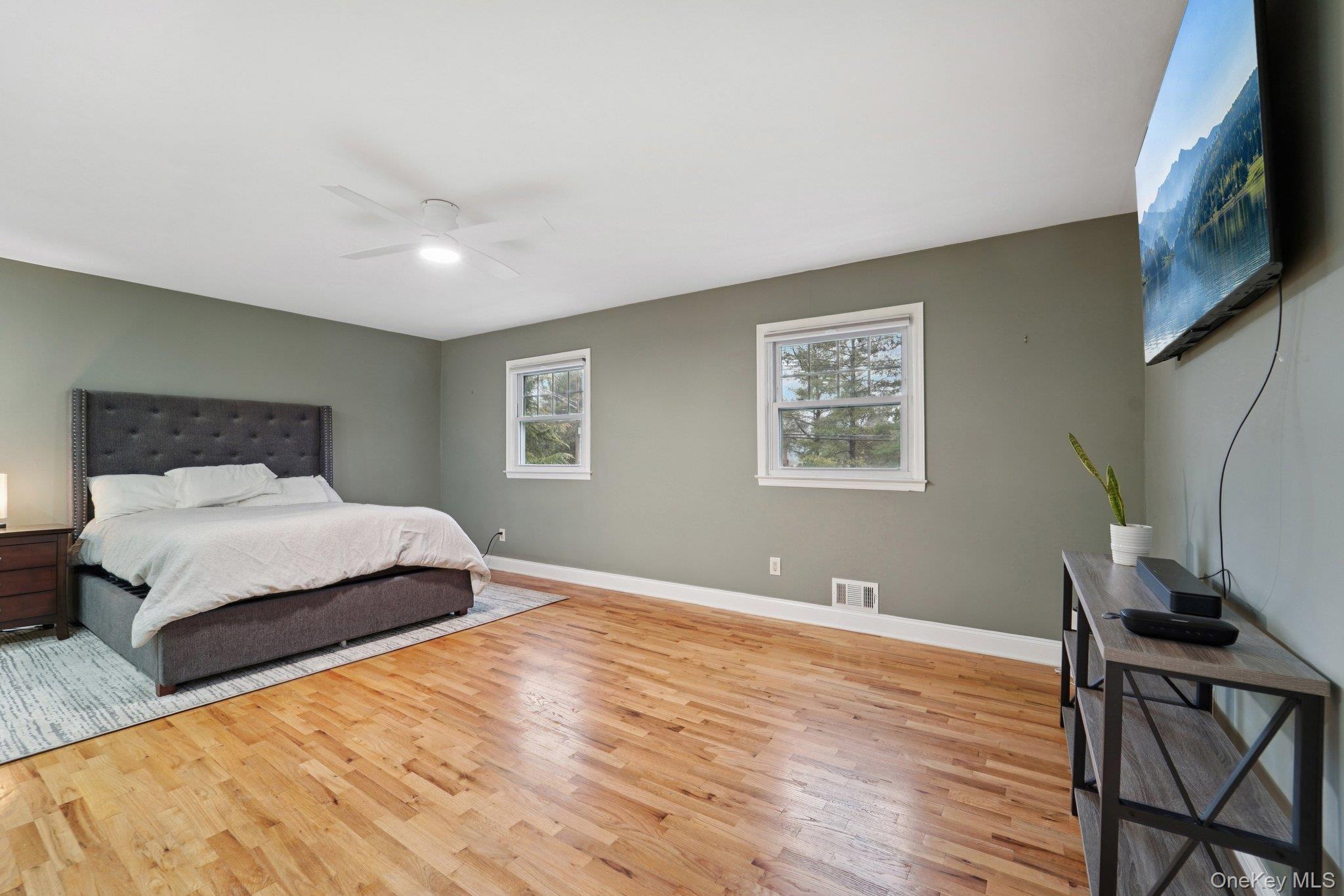 84 Townline Road Nanuet, NY 10954 - Photo 17 of 44 Bedroom featuring light wood-type flooring and ceiling fan