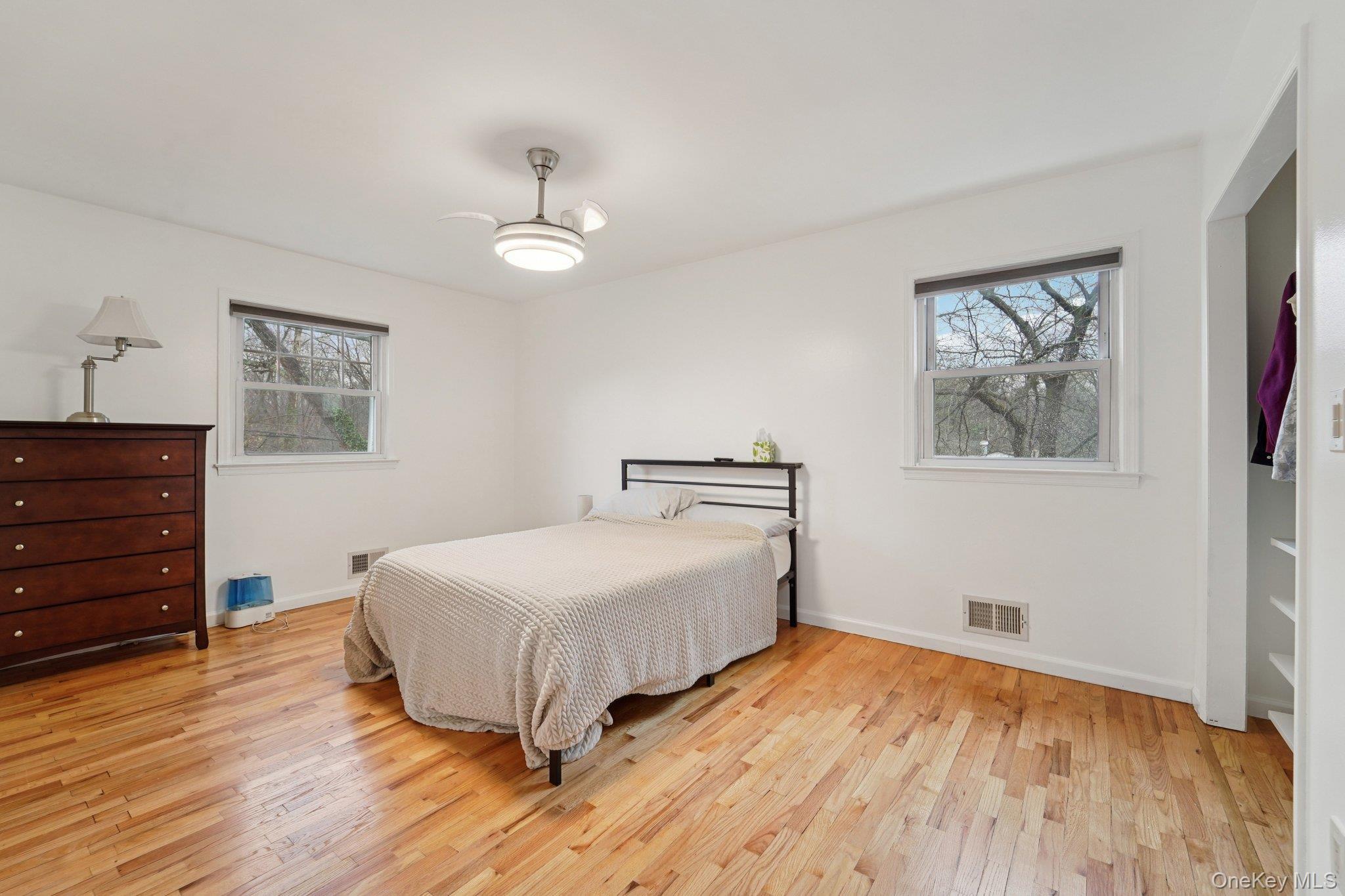 84 Townline Road Nanuet, NY 10954 - Photo 28 of 44 Bedroom with light wood-style flooring and ceiling fan