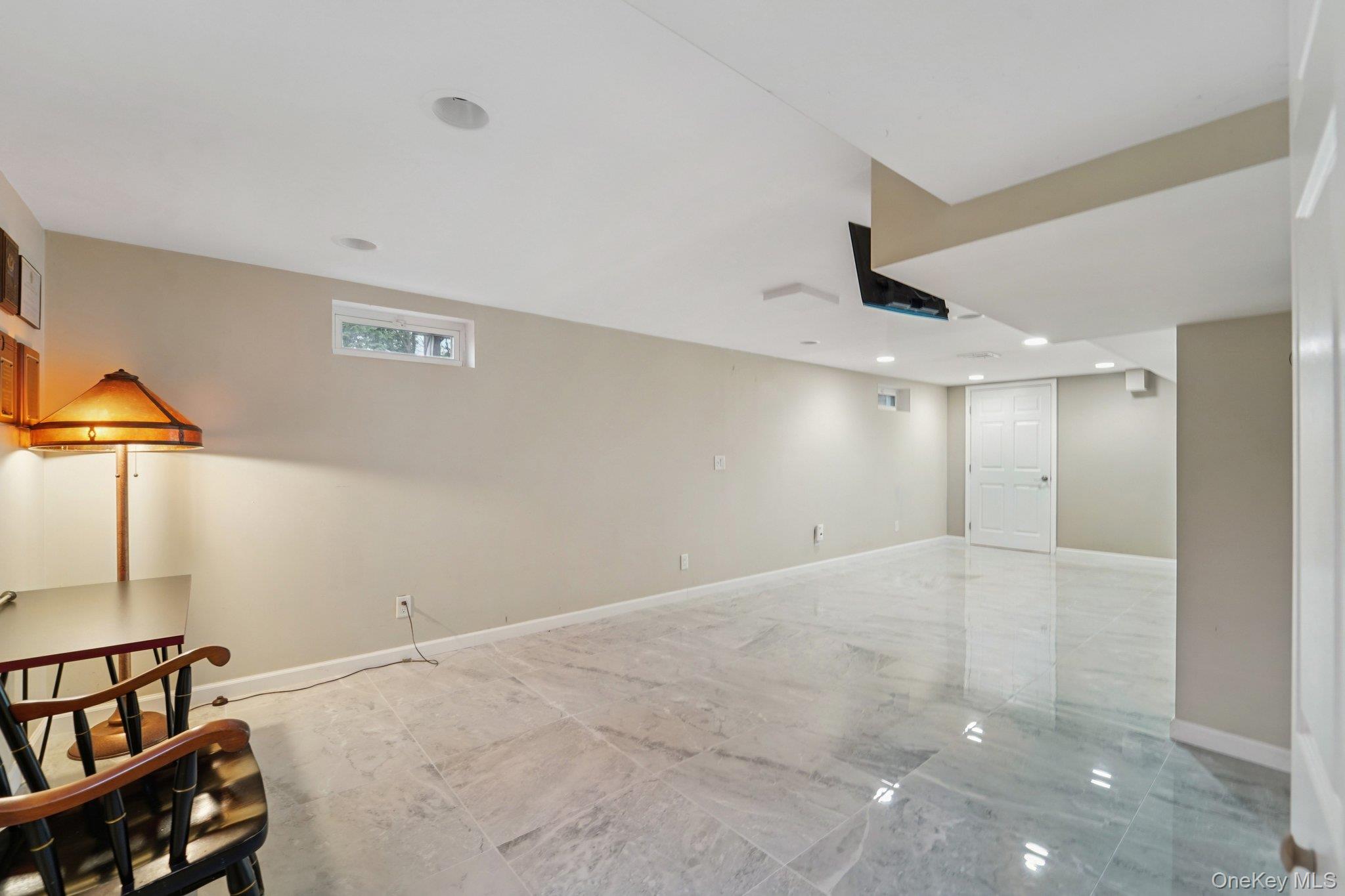 84 Townline Road Nanuet, NY 10954 - Photo 33 of 44 Spare room featuring baseboards and light marble finish flooring