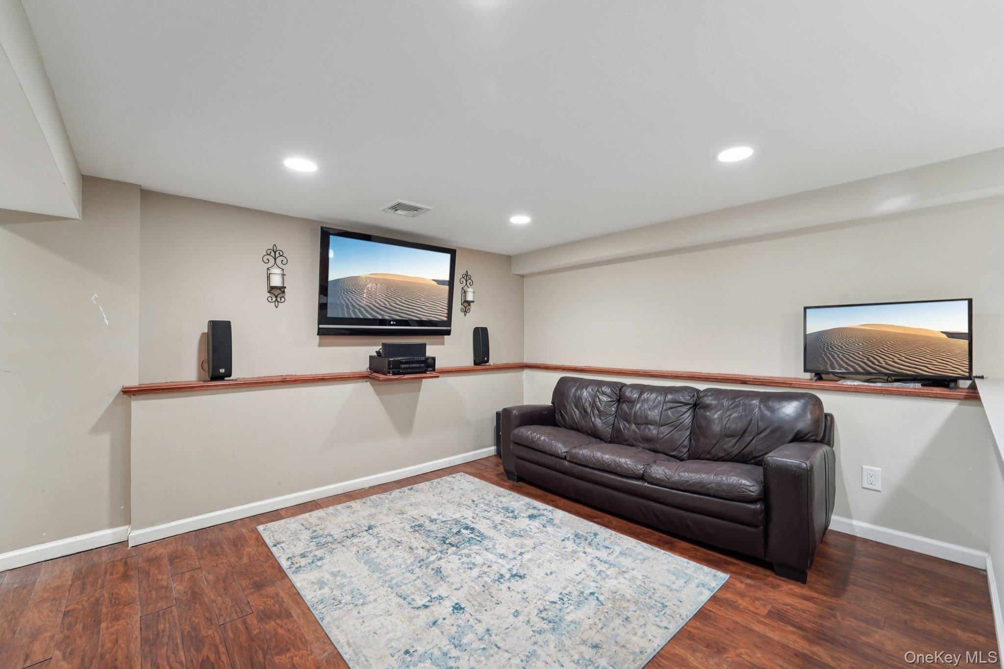 84 Townline Road Nanuet, NY 10954 - Photo 38 of 44 Living area featuring dark wood-style flooring and recessed lighting