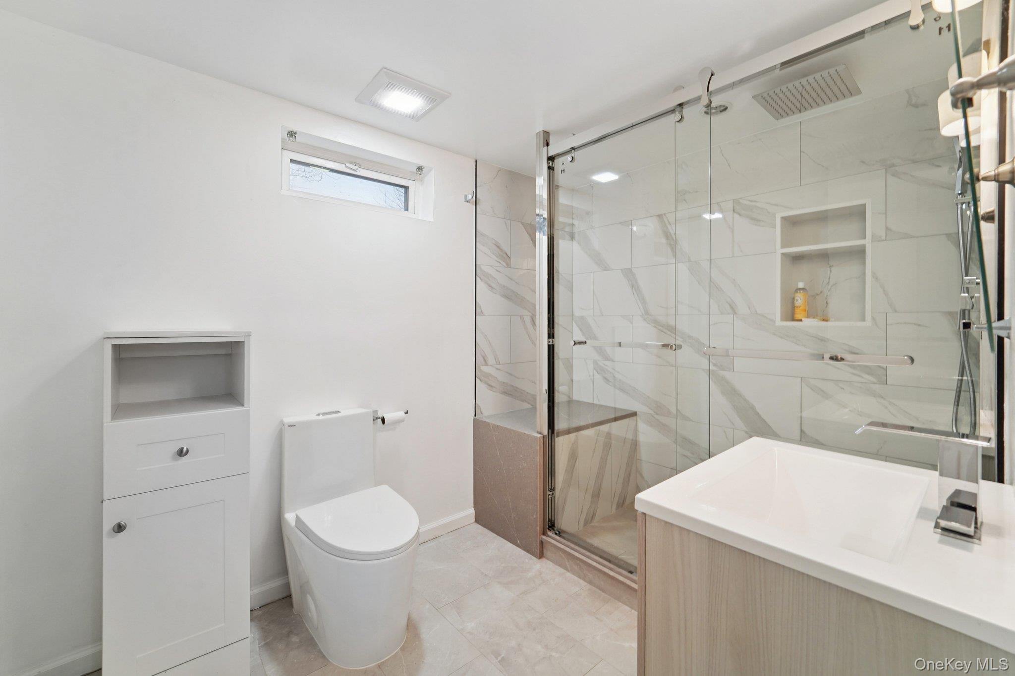 84 Townline Road Nanuet, NY 10954 - Photo 39 of 44 Bathroom featuring a marble finish shower and vanity