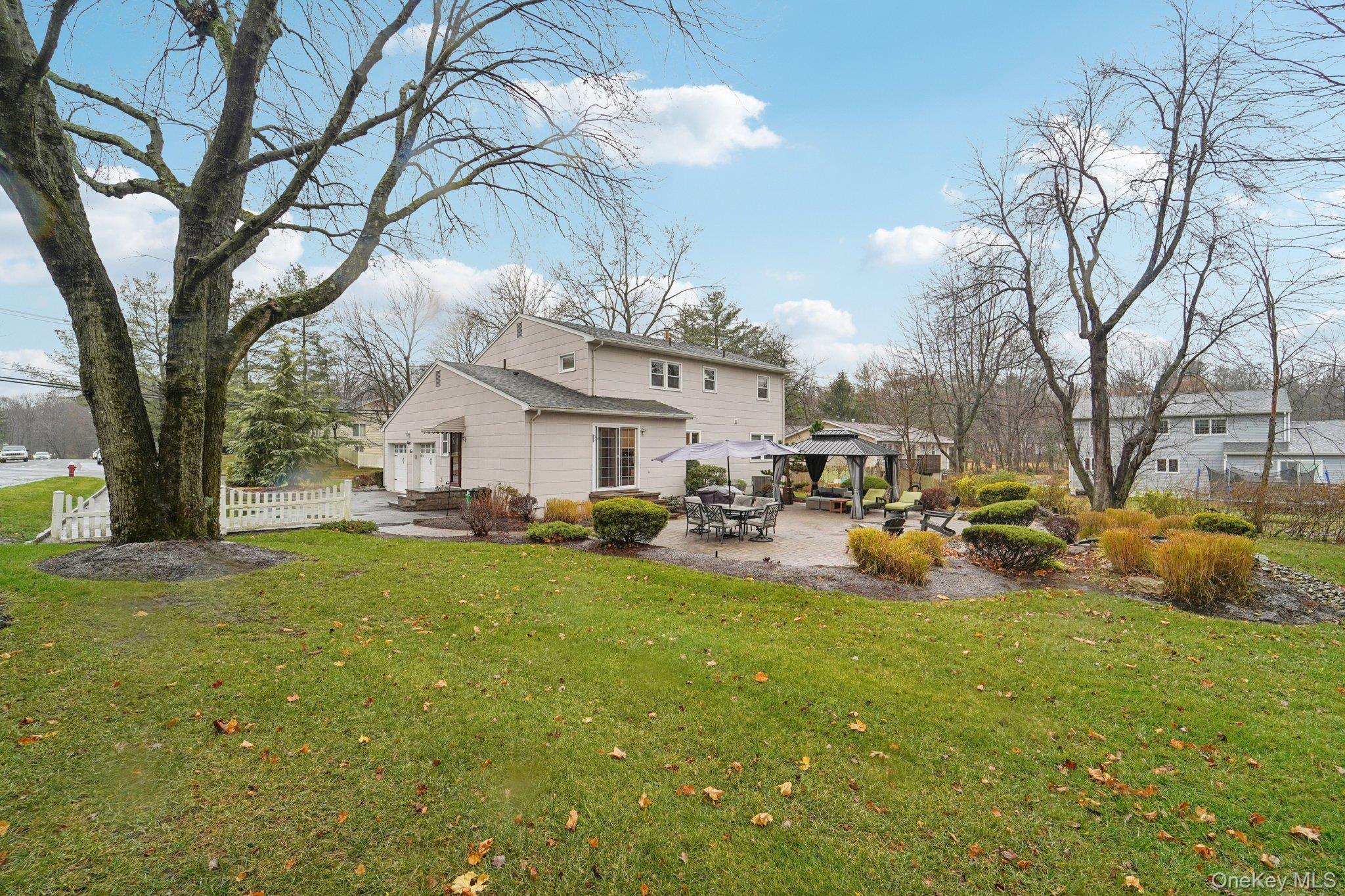 84 Townline Road Nanuet, NY 10954 - Photo 41 of 44 Rear view of property with a patio area and a gazebo