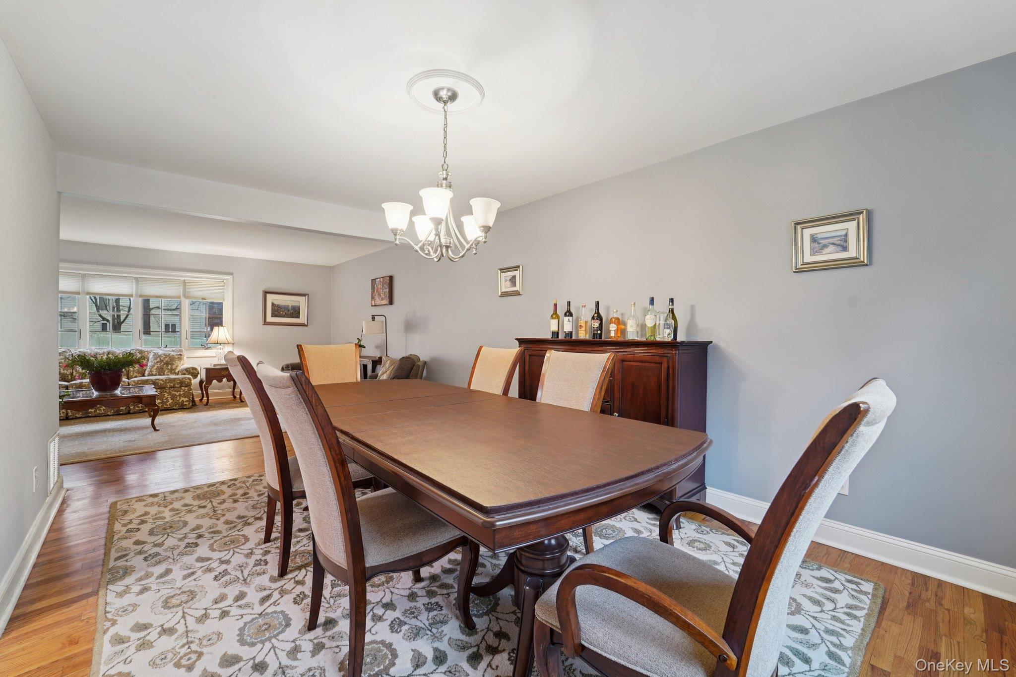 84 Townline Road Nanuet, NY 10954 - Photo 9 of 44 Dining space with light wood-type flooring and a chandelier