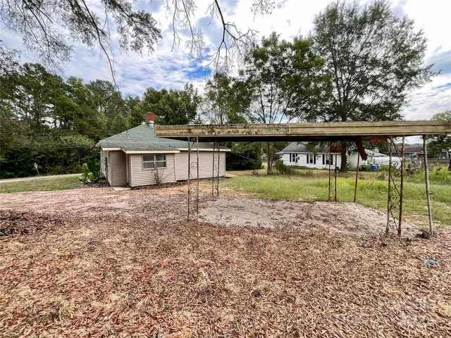 a house with a yard and a garden